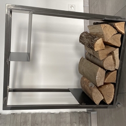 Ahigh quality firewood rack with wheels  amodern firewood rack with storage space, which is easy to handle