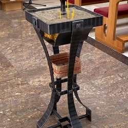 A wrought iron table in the Church of God's Mercy in Ladomirov near Svidnk (Slovakia)