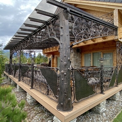 Artwork  acomplex patio roofing at acottage in High Tatras
