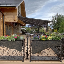 Artistic patio design  forged patio roofing, railings, lightings and furniture, designed and handcrafted by UKOVMI