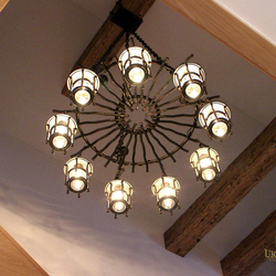 Luxury chandelier designed and hand-forged in UKOVMI for a family house - design lighting
