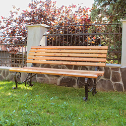 A wrought iron bench - a garden bench