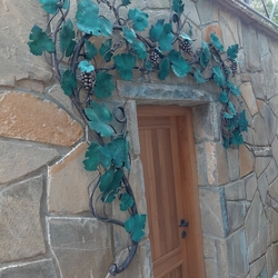 Exterior lamp forged like a vine - stylish wall light