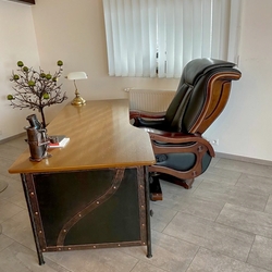 A wrought iron desk