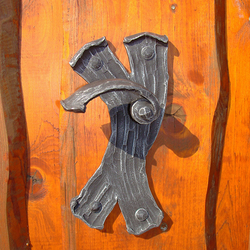 A wrought iron handle - bark