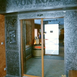 A wrought iron entrance to Von Roll Jasná restaurant