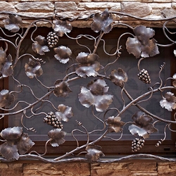 A wrought iron grille - grapes
