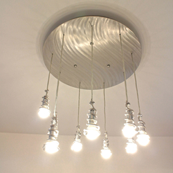 A luxury stainless steel lighting – SPIRALS – A modern handcrafted chandlier from smooth stainless steel