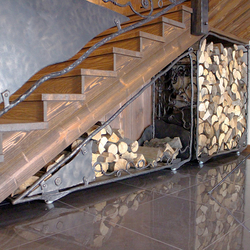 A special hand wrought iron firewood rack in a luxurious cottage